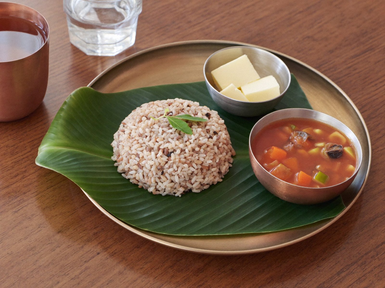 A simple sattvic meal served on a leaf plate